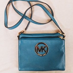 Michael Kors cross body bag with zip pockets